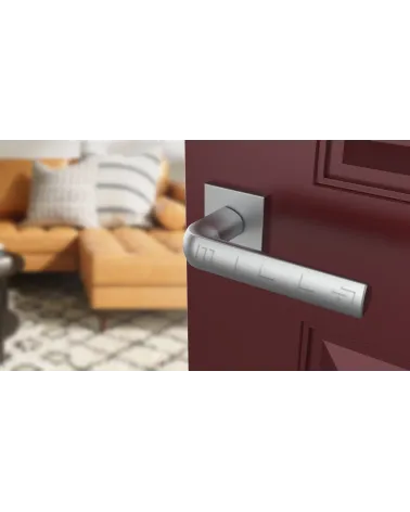MELA zamak door handle design hardware colour 2 angled top view mounted on a door