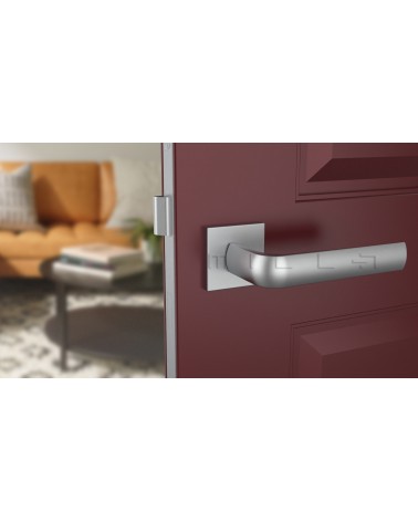 MELA zamak door handle design hardware colour 2 front view mounted on a door