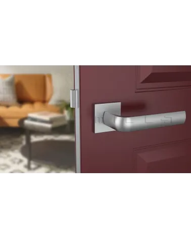 MELA zamak door handle design hardware colour 2 front view mounted on a door