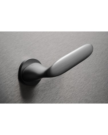 PEONIA door handle designer handle colour 2 top angled view mounted on a door