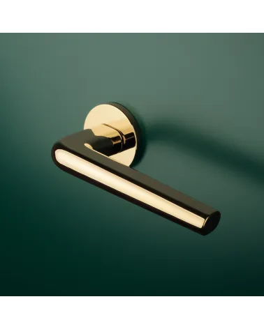 FUNKIA round door handle designer handle colour 1 fitted on a door