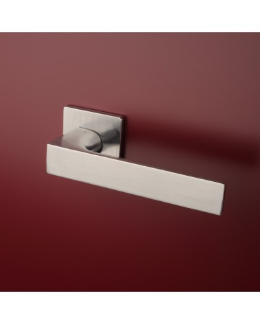 ALISSO satin chrome door handle designer handle fitted on a door