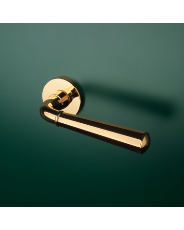 MARIGOLD polished gold door handle design handle mounted on a door
