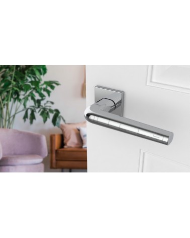 Polished chrome door handle on square plate FUNKIA - designer handle