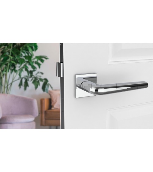 Polished chrome door handle on square plate FUNKIA - designer handle