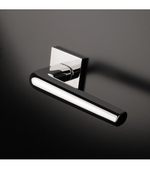Polished chrome door handle on square plate FUNKIA - designer handle