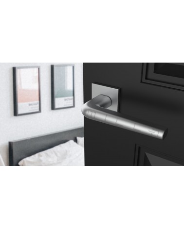 Polished chrome door handle on square plate FUNKIA - designer handle