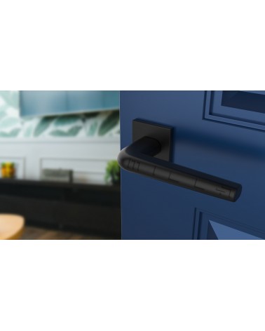 Polished chrome door handle on square plate FUNKIA - designer handle