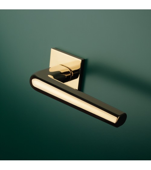 Polished chrome door handle on square plate FUNKIA - designer handle