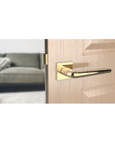 Polished chrome door handle on square plate FUNKIA - designer handle