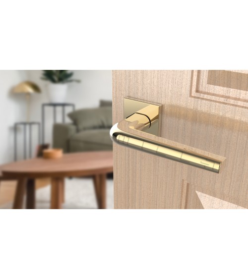 Polished chrome door handle on square plate FUNKIA - designer handle