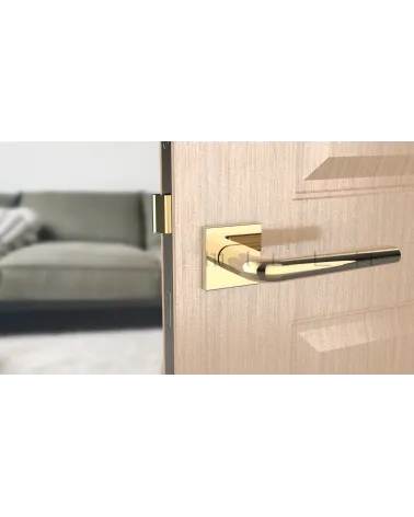 Polished chrome door handle on square plate FUNKIA - designer handle