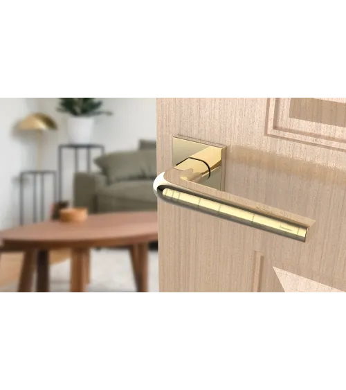 Polished chrome door handle on square plate FUNKIA - designer handle