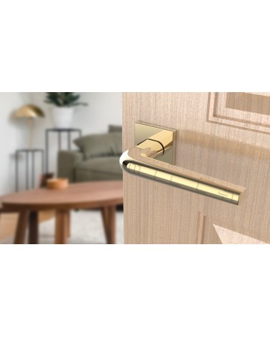 Polished chrome door handle on square plate FUNKIA - designer handle