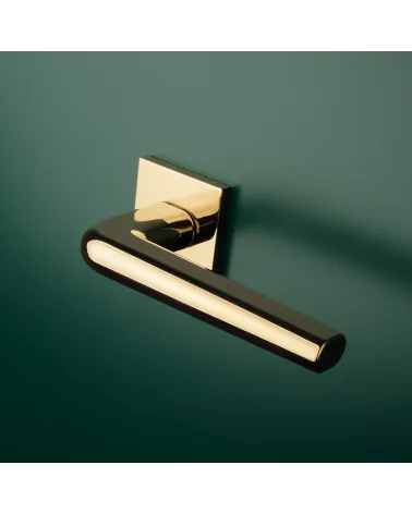 Polished chrome door handle on square plate FUNKIA - designer handle