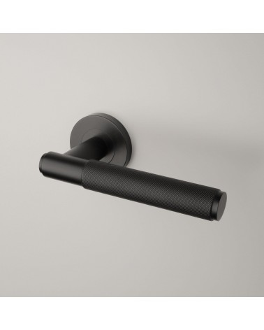 Black Sterk OVAL 1741 door handle design handle mounted on a door