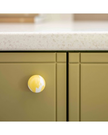 Yellow beech wood furniture knob design handle zoomed view mounted on a cabinet