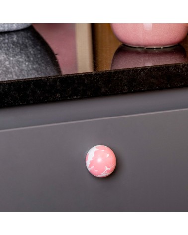 Pink beech wood furniture knob design handle zoomed view mounted on a cabinet
