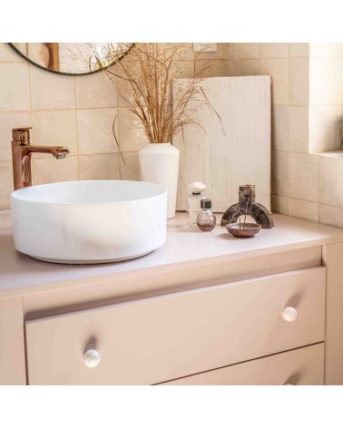 Rose taupe beech wood furniture knob design handle installed on a bathroom cabinet