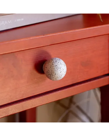 White/black mix beech wood furniture knob design handle fixed on a wooden drawer