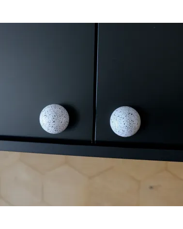 White/black mix beech wood furniture knob design handle fixed on a cabinet front