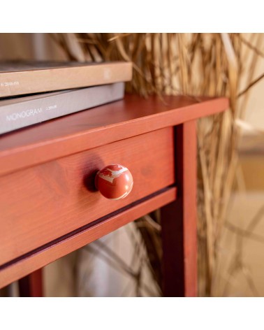 Cherry red beech wood furniture knob design handle fixed on a wooden drawer