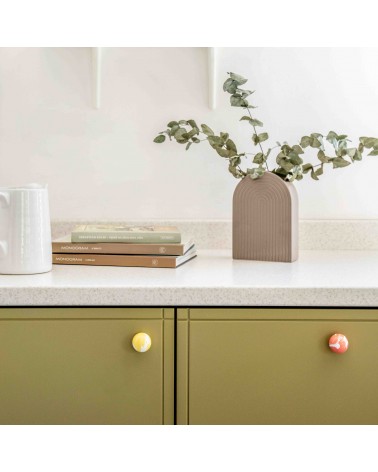 Cherry red beech wood furniture knob design handle installed on a cabinet front