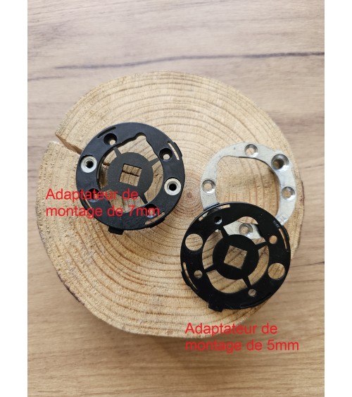 Four mounting adapters for door handles