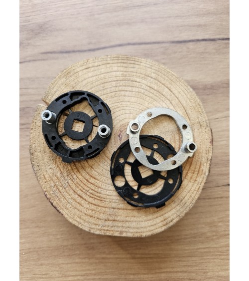 Four mounting adapters for door handles