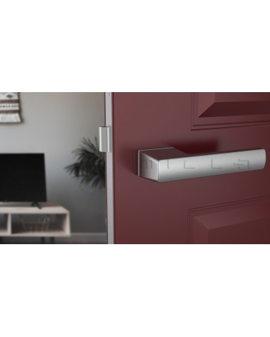 Satin chrome BRISA design door handle fitted on a door
