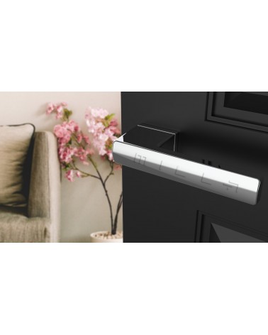 Polished chrome BRISA design door handle fitted on a door