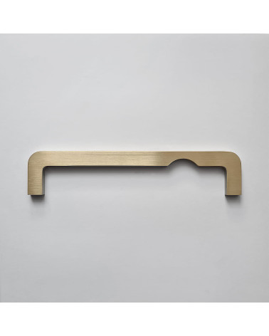 ISA DOT brass furniture handle designer handle front view on grey surface
