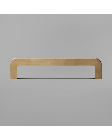 ISA brushed brass furniture handle designer handle fixed on a surface