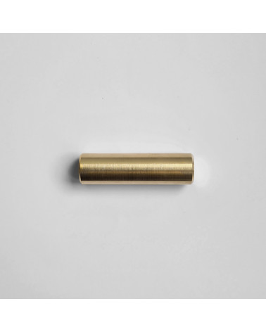 SIV M brass furniture handle design handle front view on grey surface