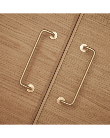 AVA M polished brass lacquered furniture handle designer handle top view mounted on a cabinet