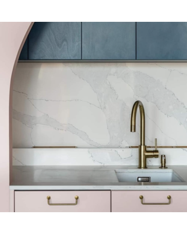 AVA M polished brass lacquered furniture handle designer handle installed on a kitchen unit