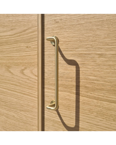 AVA brass furniture handle design handle front view mounted on cabinet