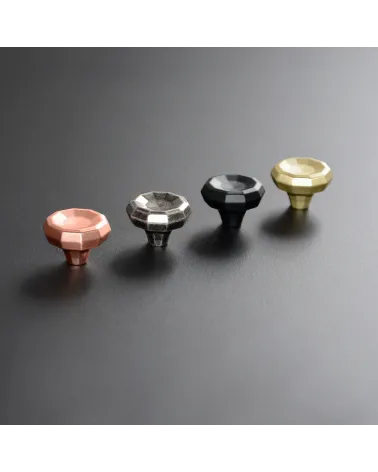 CAMPANA designer furniture knob handle arranged in a line on a light surface