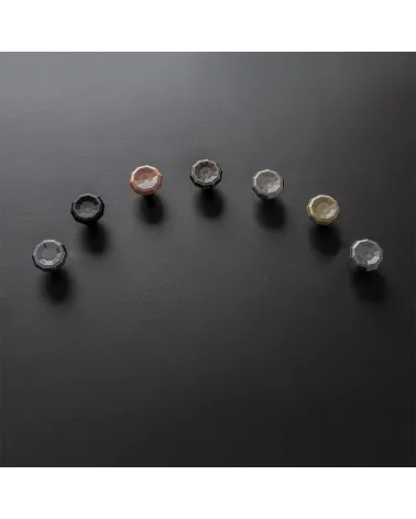 CAMPANA designer furniture knob handle arranged in an arc on a black surface