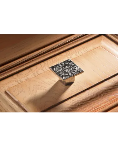 Furniture knob SPARTA design handle fitted on a wooden unit