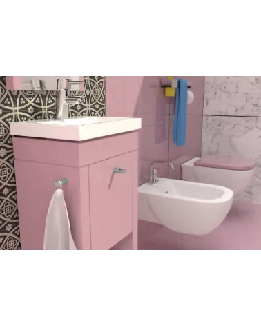 CARTAGENA design furniture knob handle fixed on a pink bathroom cabinet