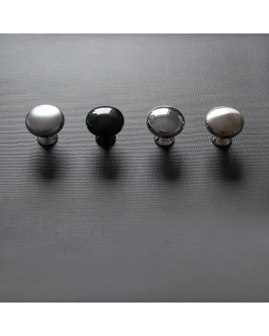 TORONTO furniture knob designer handle aligned horizontally on a dark surface