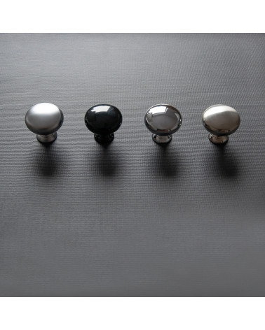 TORONTO furniture knob designer handle aligned horizontally on a dark surface