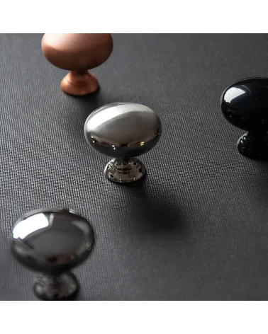 TORONTO furniture knob designer handle placed on a black surface