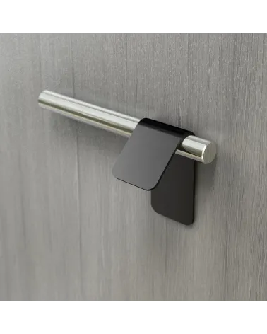 Matt black/bright chrome furniture handle TORN-3 designer handle fitted on grey surface