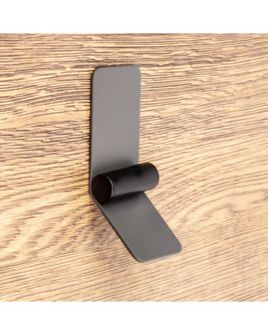 Anthracite/matt black furniture handle TORN-2 designer handle fitted on wooden surface