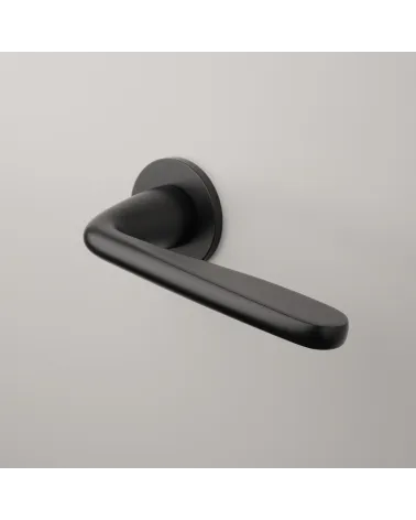 Contemporary HIACYNTA Door Handle designer handle mounted on a door