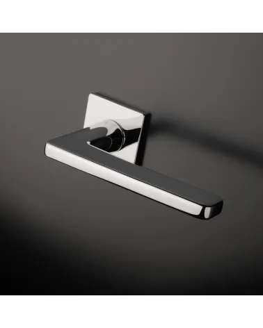 Contemporary SETIA Door Handle designer ironmongery fitted on a door