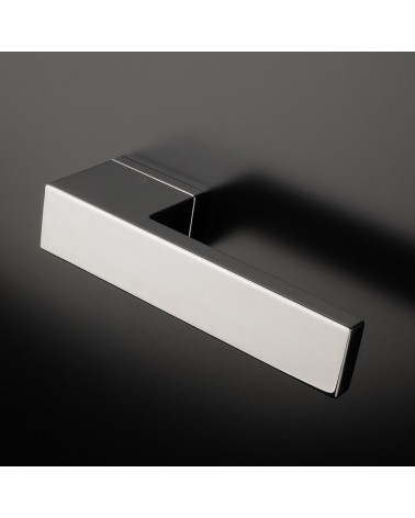 Polished chrome CARLINA door handle designer handle mounted on a door