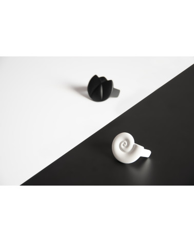 CALDO furniture handle design handle displayed on a two-tone background